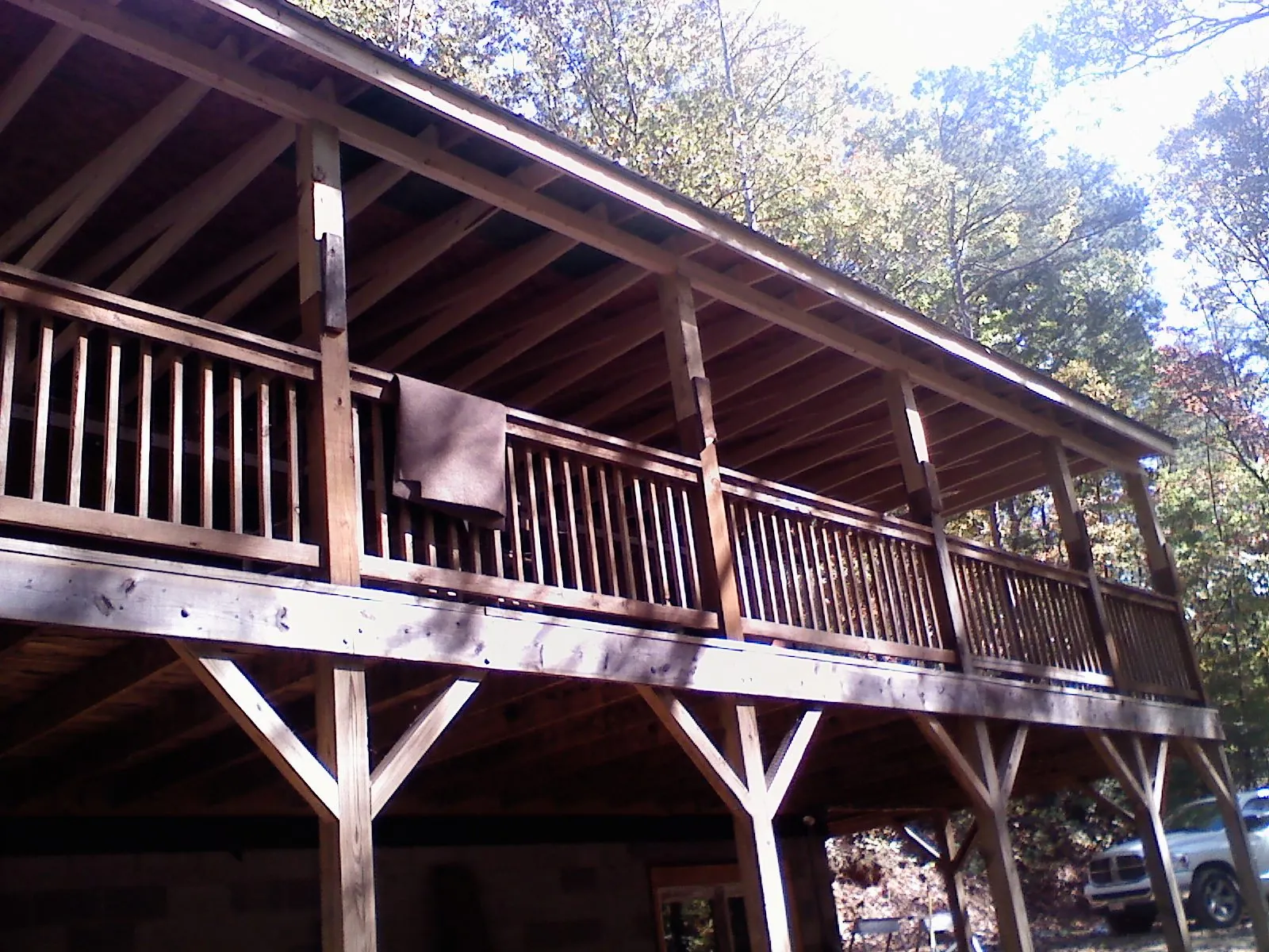 Timber framing under a new elevated porch and deck — Roof Leak Repair in Madisonburg by Roofing Brothers